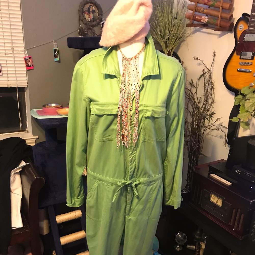 Green coveralls .